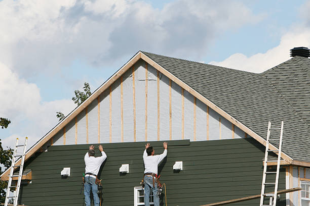 Professional Emergency Siding Repair technician working in Champion, PA